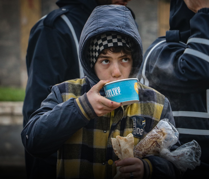 Boy Easting Bread